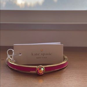 Kate Spade pink bracelet.